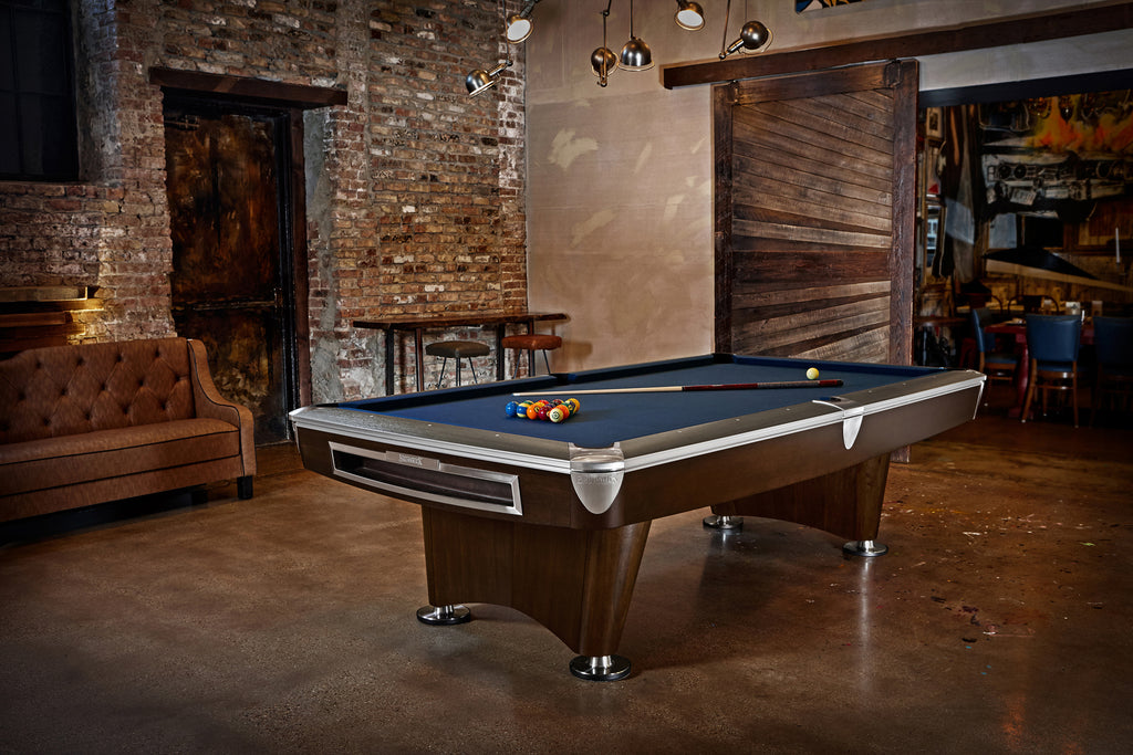Gold Crown VI Pool Table in room with balls on table