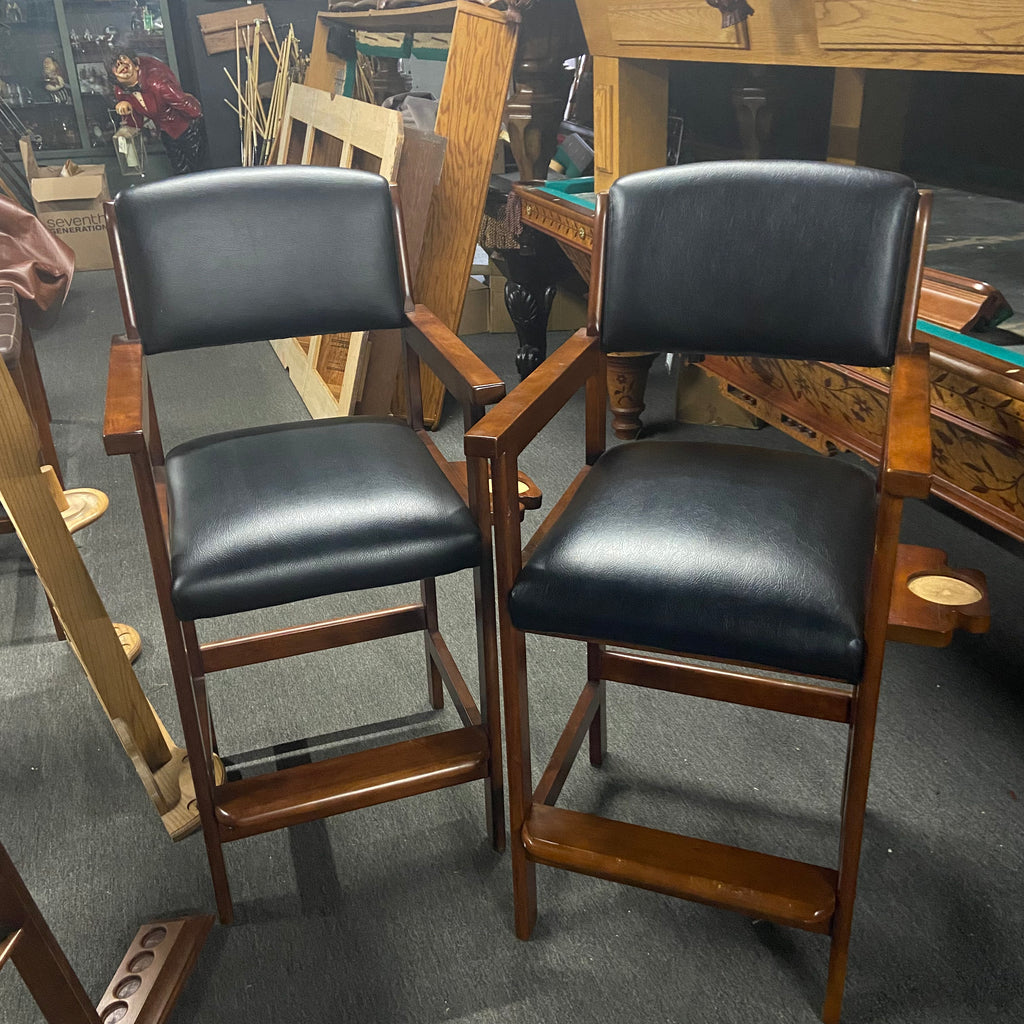 Two spectator chairs in mahogany finish